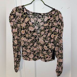 Flower print long sleeve top. Good to dress down or for the office